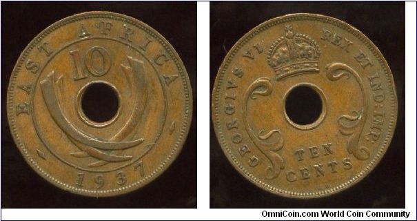 British East Africa
1937
10 cents
Value above crossed elephant tusks & date
Crown above value 
Mint mark KN = Kings Norton Birmingham