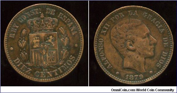 1879
10 Centimos
Coat of Arms 
Alfonso XII 1886-1931
Mint Mrk oM = Oeschger Mesdach & Co