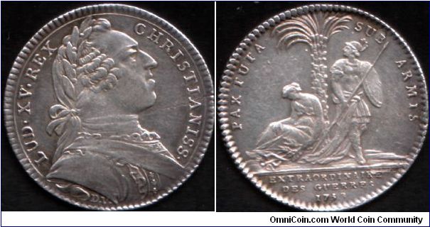 silver jeton minted for `extraordinaires des guerres' in 1753. Note the split flan at 3pm obverse running from rim to centre of coin.
