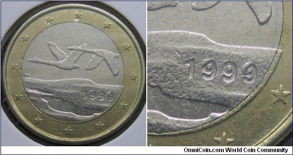 1 euro - 2 partially filled 9s.