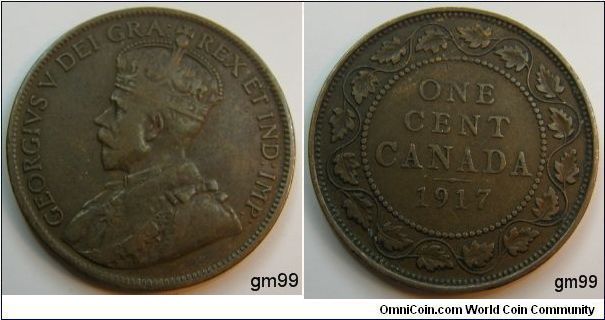 One Cent (Bronze) 
Obverse: Crowned head of King George V left,
GEORGIVS V DEI GRA REX ET IND IMP
Reverse:Legend within wreath,
ONE CENT CANADA date 1917