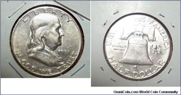 Benjamin Franklin Half dollar, 50 cents. Metal content:
Silver - 90%
Copper - 10%
1951S-Mintmark: S (for San Francisco, CA) centered above the bell on the reverse