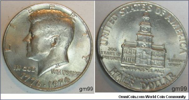Kennedy half dollar.
In 1975 and 1976, the bicentennial half dollar was minted showing Independence Hall on the reverse