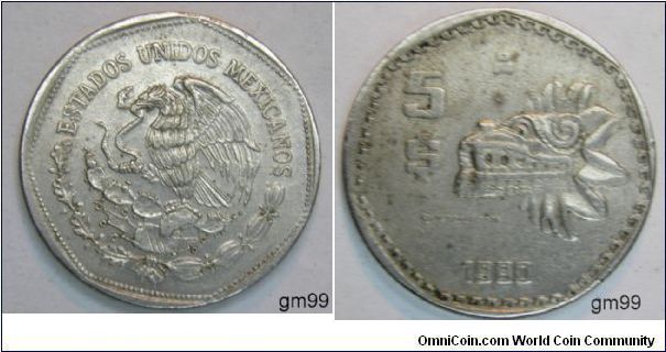 Copper-Nickel,27mm SUBJECT: Quetzalcoatl. Obverse-National arms, eagel lfet. Reverse-native sculpture to lower right of value and dollar sign. Edge Lettering: LIBERTAD Y INDEPENDENCIA. NOTE: Inverted and normal edge legend varieties exist in the 1980 and 1981 dates. 5 Pesos