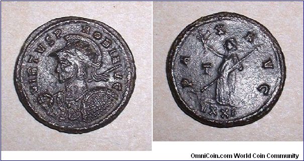 PROBUS - Antoninianus - 280/282 - Ticinum mint - VIRTVS PROBI AVG, helmeted and cuirassed bust left, holding spear & shield / PAX AVG, Pax standing left with branch & scepter, T to left, VXXI in ex. mm 21,9 grs 4,2