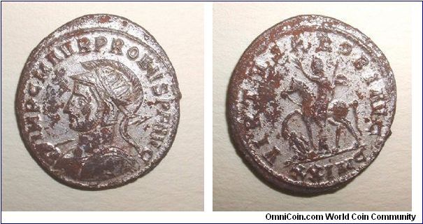 PROBUS -  Antoninianus. Cyzicus mint - IMP C M AVR PROBVS P F AVG, helmeted cuirassed bust left holding spear and shield / VIRTVS PROBI AVG, Probus, on horseback, with scepter & raising hand, trampling bound captive,  XXIMC in ex. Mm 23,5 grs 3,5
