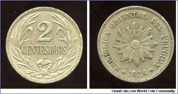 1924
2 Centesimos
Value between ears of wheat
Radiating Sun
Minted Poissy, France