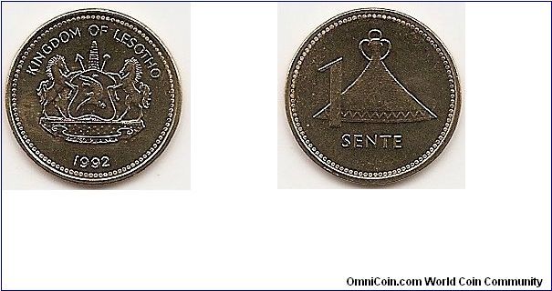 1 Sente
KM#54
Brass, 16.5 mm. Ruler: Letsie III Obv: Arms with supporters
Rev: Basotho hat and value