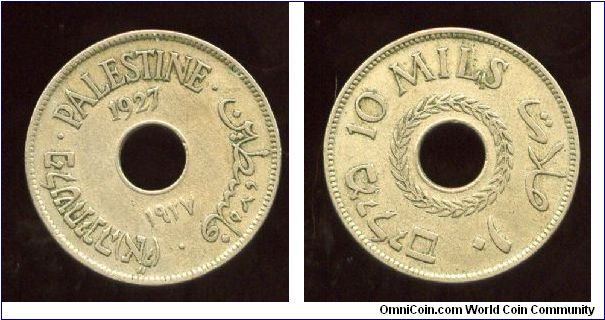 British mandate  
1927
10 Mills
Hole in center & date
Wreath round hole in center & value in 3 languages