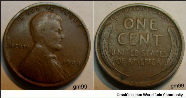 The VDB,  stands for Victor David Brenner the designer / engraver of the famous Lincoln penny and 1909 was the first year of issuance ( and centennial of Lincoln's birth ).
Composition: .950 Copper, .05 Tin and Zinc 
Diameter: 19 mm 
Weight: 3.11 grams 
Edge: Plain 
1909 V.D.B. Wheat Penny