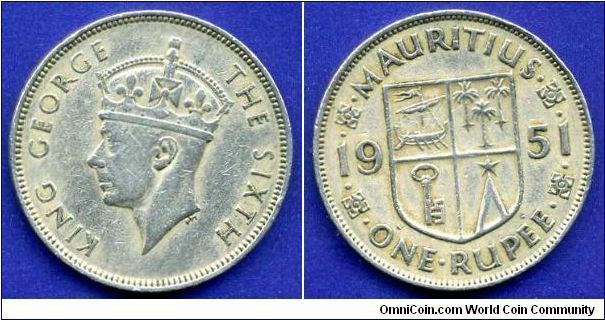 1 rupee.
George VI (1936-1952) king.
Mintage 1,000,000 units.


Cu-Ni.