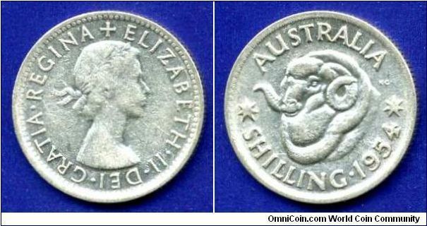 1 Shilling.
Elizabeth II Dei.Gratia.Regina+.


Ag500f. 5,65gr.