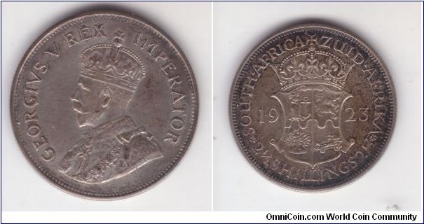 Proof half crown from 1923 set. But it was probably cleaned in the past....