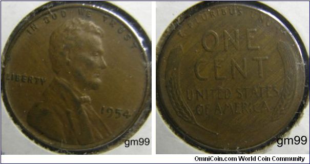 Bronze/Wood grain design on the Reverse 
1954 Wheat Penny