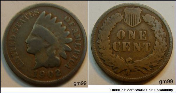 Indian Head Penny
The obverse:shows UNITED STATES OF AMERICA, the head of Liberty wearing a feather head dress of a Native American.
Reverse:ONE CENT within an oak wreath (a laurel wreath before 1860), with three arrows inserted under the ribbon that binds the two branches of the wreath. Between the ends of the branches is the shield of the United States