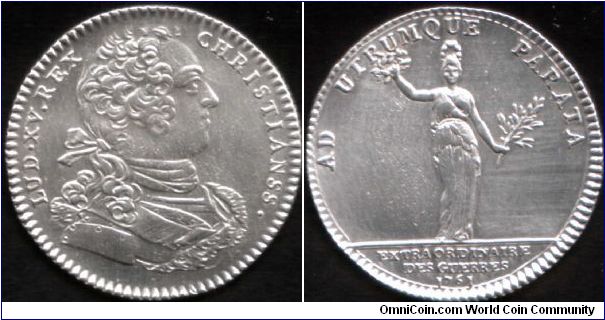 silver jeton issued for the Extraordinaires des Guerres in 1761. An interesting jeton in that it combines an error legend obverse die from 1734 with a reverse die dated 1761.