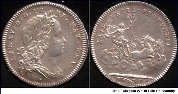 This is what is known as a `stock jeton'. These were struck and held in reserve against the event of there being a shortfall in the requirements for jetons from the various administrations.This one bears a young bust of Louis XV (by Brenet) and was probably minted in the very early years of his reign