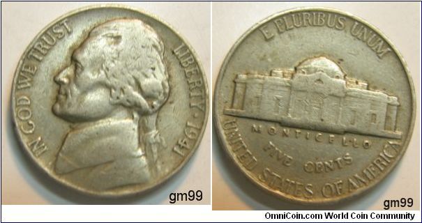 1941 Jefferson Nickel
 Metal content:
Copper - 75%
Nickel - 25%
Weight: 5 grams
Edge: Plain
Mintmark:None (for Philadelphia) above the building on the reverse