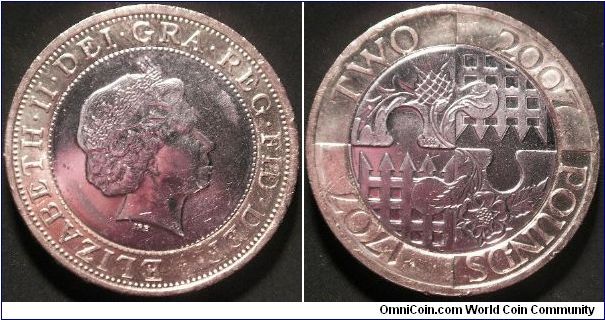 Act of Union two pound coin.
Edge: Milled with UNITED INTO ONE KINGDOM
