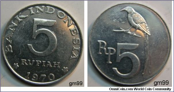 Rupiah (Aluminum) : 1970
Obverse; Legend and date around value in two lines, two stars either side of date, 
BANK INDONESIA 5 RUPIAH date 1970
Reverse; Long-tailed bird sitting on branch left above 5,
RP 5
