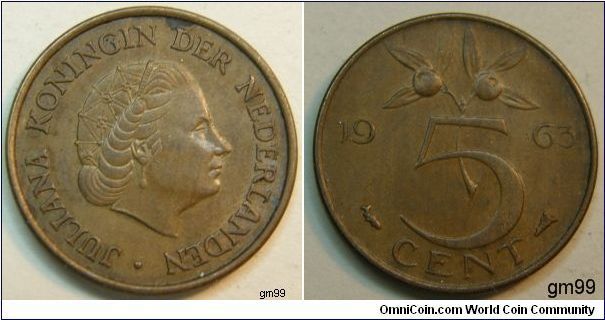 5 Cents (Bronze) Obverse; Queen Juliana right,
JULIANA KONINGIN DER NEDERLANDEN
Reverse; Two flowers above 5, date 1963, 5 CENTS