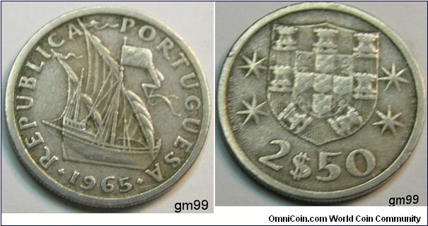 Copper-Nickel 2 1/2 Escudos (1963-1985)
Obverrse;  Ship sailiing right 
REPUBLICA PORTUGUESA date 1965
Reverse;  Shield having seven castle towers surrounding five shields in the form of a cross, each with five dots on it, all superimposed upon globe, two stars either side, value below 
2$50