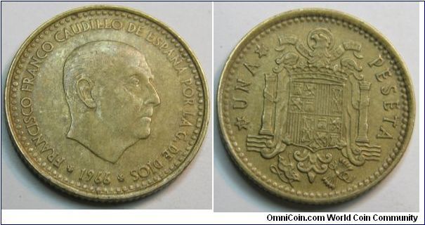 Aluminum-Bronze, 1 Peseta 
OBverse-  Head of Franco right 
FRANCISCO FRANCO CAUDILLO DE ESPANA POR LA G DE DIOS 1966 
Reverse-  Crowned arms of Spain, Pillers of Hercules either side 
UNA PESETA