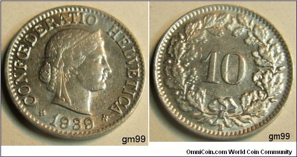 10 Rappen (Copper-Nickel) : 1879-1993
Obverse: Head of Helvetia right, LIBERTAS on headband,
CONFOEDERATIO HELVETICA date
Reverse: Value within wreath,
10