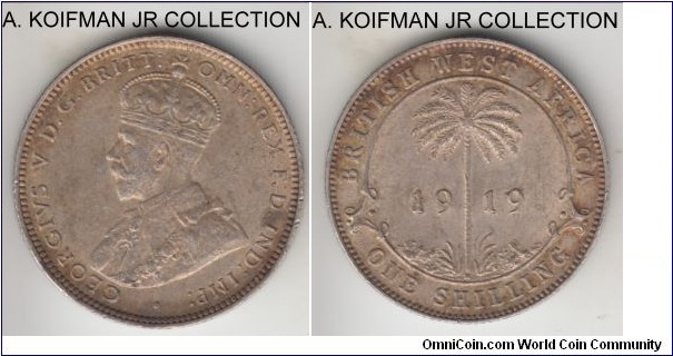 KM-12, 1919 British West Africa shilling, Heaton mint (H mintmark); silver, reeded edge; first George V type, lower mintage year in toned good extra fine condition.