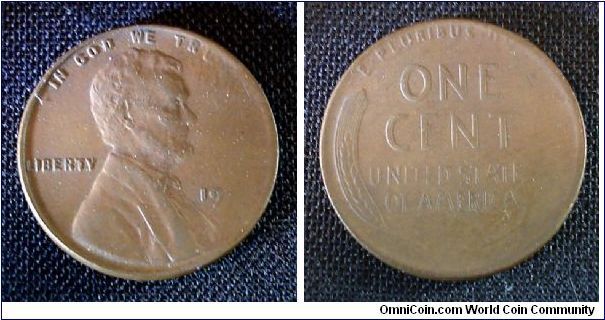 A nice looking error wheatback cent. It is struck on a half thin planchet, probably the end of a sheet. The entire right 1/4 is unstruck.