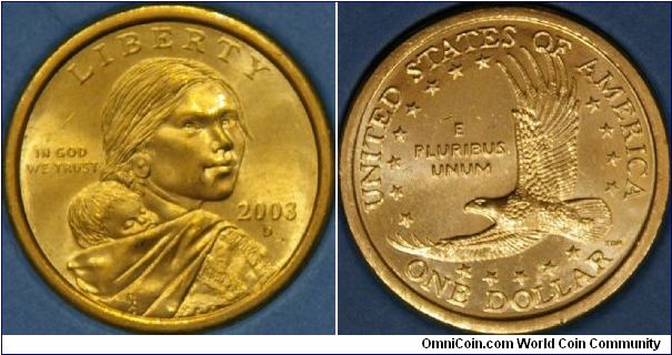 Sacagawea 'gold' dollar.  Replaced the Anthony, the mint tried to make it more distinguishable from the quarter by changing it's color.  trouble is, it looses it's luster very quickly.  Very hard to find any dates in circulation past 2001. Cu 77%, rest Zn, Mn, Ni. 26.5 mm
