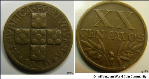 This one has a Die Crack between the 4 and 9 in the date.  Bronze 10 Centavos 
Obverse;  Five shields arranged in the form of a cross, each having five dots on it 
REPVBLICA PORTVGVESA date 
Reverse;  Value over wreath 
XX CENTAVOS