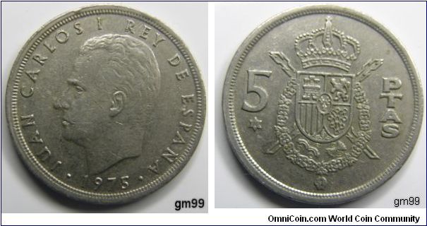 5 Pesetas (Copper-Nickel) Obverse; Bare head of Juan Carlos left,
JUAN CARLOS I REY DE ESPANA 1975
Reverse Crowned arms of Spain with X behind, in a garland, date 75 on star below 5,
5 PTAS