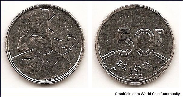 50 Francs
KM#169
Nickel, 22.5 mm. Obv: Face, left, on divided coin Rev:
Denomination, date at bottom Rev. Leg.: BELGIE