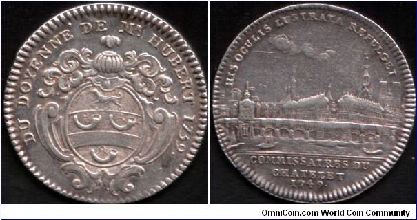 Silver jeton issued for Monsieur Hubert, Doyen de Chatelet in 1759. Obverse his coat of arms / reverse a beautiful view of Le Chatelet and Notre Dame. All issues post 1749 bore the same reverse.