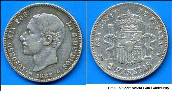 2 Pesetas.
King Alfonso XII (1874-1885).
'Big Nose' profil.
(M) Madrid mint.


Ag835f. 10,0gr.