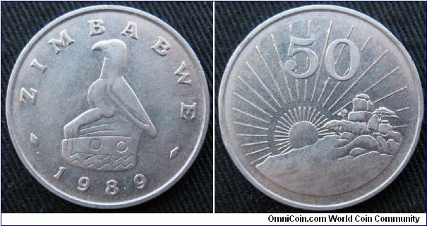 50 cents.  Obverse Zimbabwe Bird, reverse rocks at Matapos National Park.