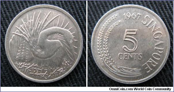 5 cents.  Obverse is snake-bird on nest.