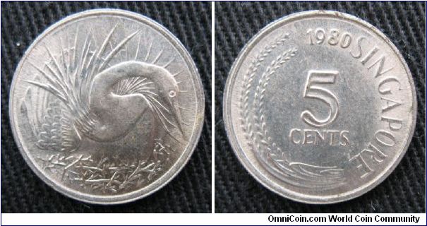 5 cents.  Obverse is snake-bird (egret) in nest.