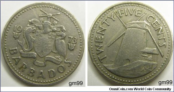 25 Cents (Copper-Nickel) : 1973-2000
Obverrse: Date separated by arms, trident below each half of date, shield with Bearded Fig tree on it, Pride of Barbados flower in each upper corner, dolphin to left and pelican to right, above is a helmet and a hand holding two crossed pieces of sugarcane,
date BARBADOS PRIDE AND INDUSTRY (on banner)
Reverse: Morgan Lewis Sugar Mill,
TWENTY FIVE CENTS