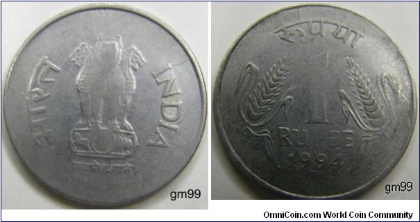 1 Rupee (Stainless-Steel) : 1992-2000
Obverse: National Emblem of India, four lions standing back to back, from the Sarnath Lion Capital,
INDIA (English and Hindi)
Reverse: Two grain ears,
1 RUPEE date.