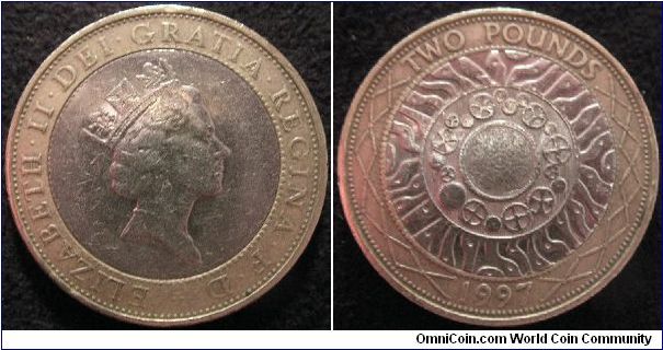 'Rare necklace' (not rare) British first issue bi-metallic two pound coin.
Features the old portrait of Queen Elizabeth II which was replaced in 1998, this makes some people believe  this is a rare coin.