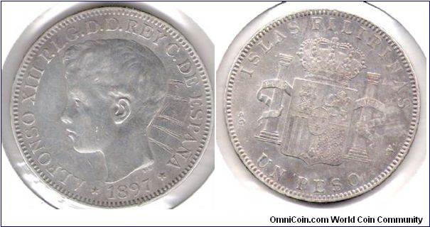 1 Piso, Spanish Philippines.  Coin is sadly defaced on the obverse, where someone scratched their intials.