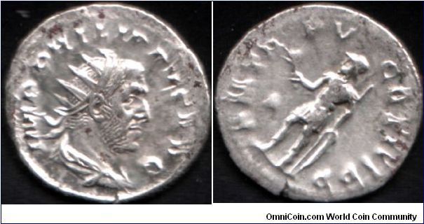 Roman silver `antoninianus' of Philip I (The Arab). Obverse radiate bust of Philip. Reverse, Mars with olive branch, leaning on shield. The example on wildwinds says COS II PP reverse but it looks like COS III PP to me (as with this one).