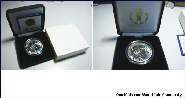 The box of Kazakhstan 2006 500 tenge, commemorating space.