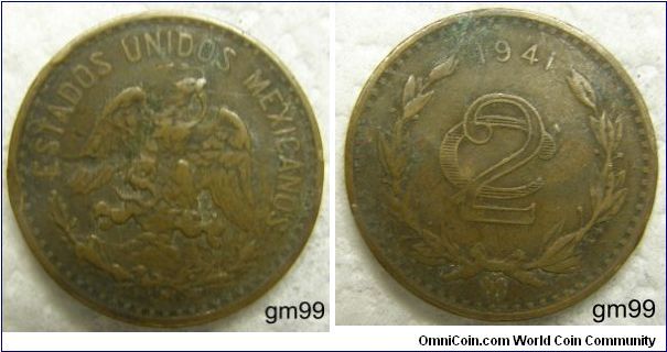 2 CENTAVOS, OBVERSE: Eagle standing facing on cactus, snake in beak,
ESTADOS UNIDOS MEXICANOS. REVERSE: VALUE BELOW DATE IN WREATH. NOTE: MINT MARK, Mo