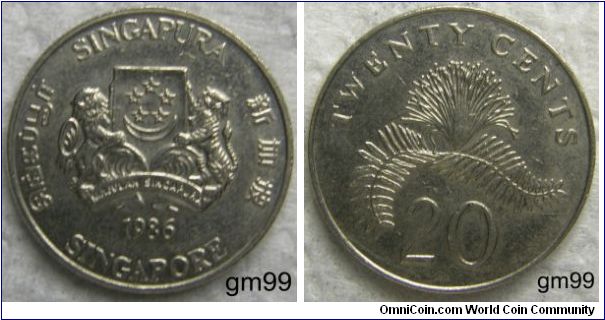 20 CENTS.Arms, 5 stars in circle above crescent on shield, a lion on left and tiger on right, below motto MAJILAH SINGAPURA,
SINGAPURA MAJULAH SINGAPURA date SINGAPORE. REVERSE: TWENTY CENTS, PLANT, 20