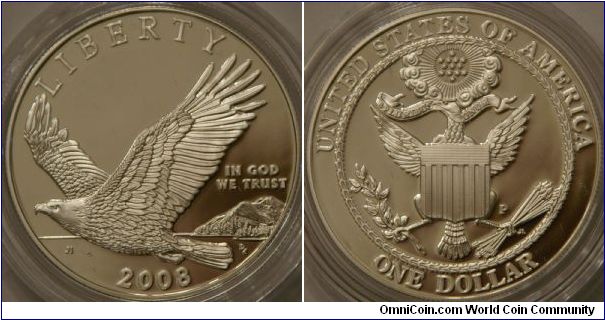 eagle in flight and replica of original Great Seal of the United states featured on Bald Eagle Commemorative dollar coin.  Celebrating the removal of the national symbol of the US from the endangered species list.  Ag (10% Cu), 38 mm (1.5 in)