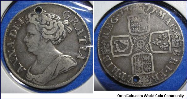 Queen Anne, shilling.  Holed, but not in a terrible spot :)