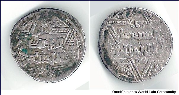 Either a Mamluk or an Ayyubid silver coin
